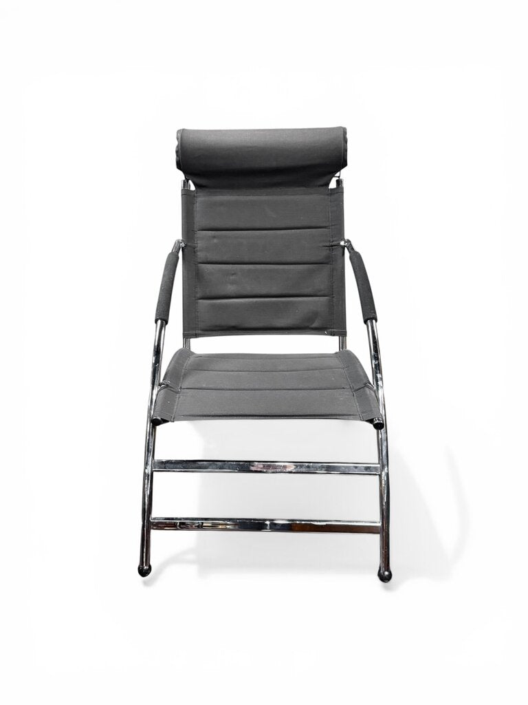 Black And Chrome Lounge Chair And Ottoman