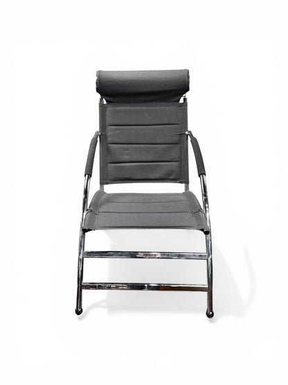 Black And Chrome Lounge Chair And Ottoman