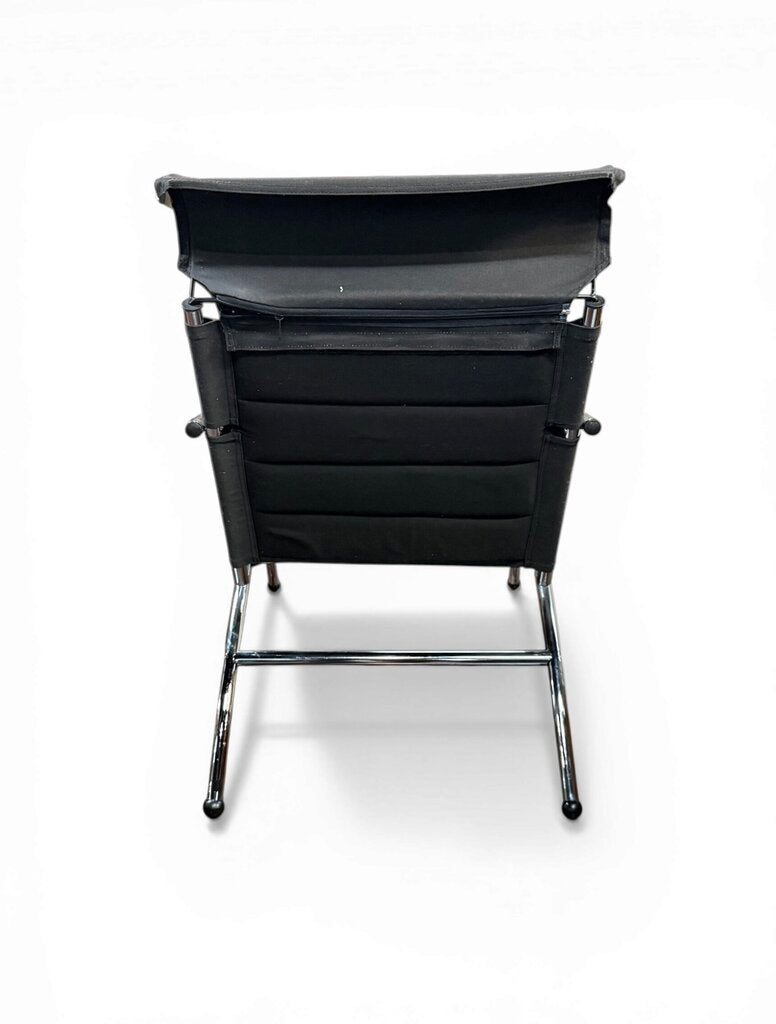 Black And Chrome Lounge Chair And Ottoman