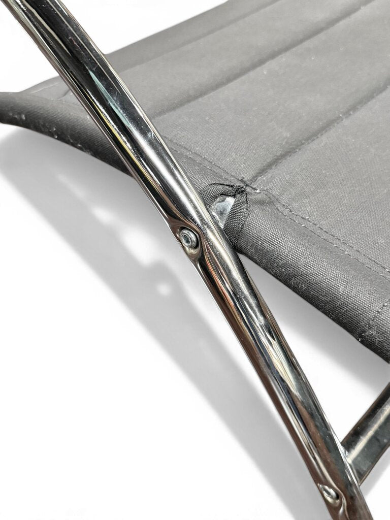 Black And Chrome Lounge Chair And Ottoman
