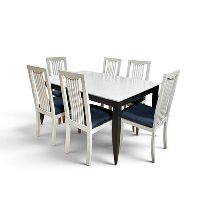 White Maple Dining Table With 2 Leaf Extensions and 6 Black Upholstered Chairs