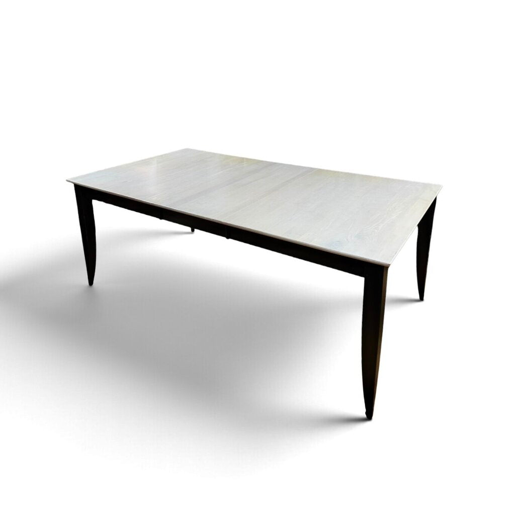 White Maple Dining Table With 2 Leaf Extensions and 6 Black Upholstered Chairs