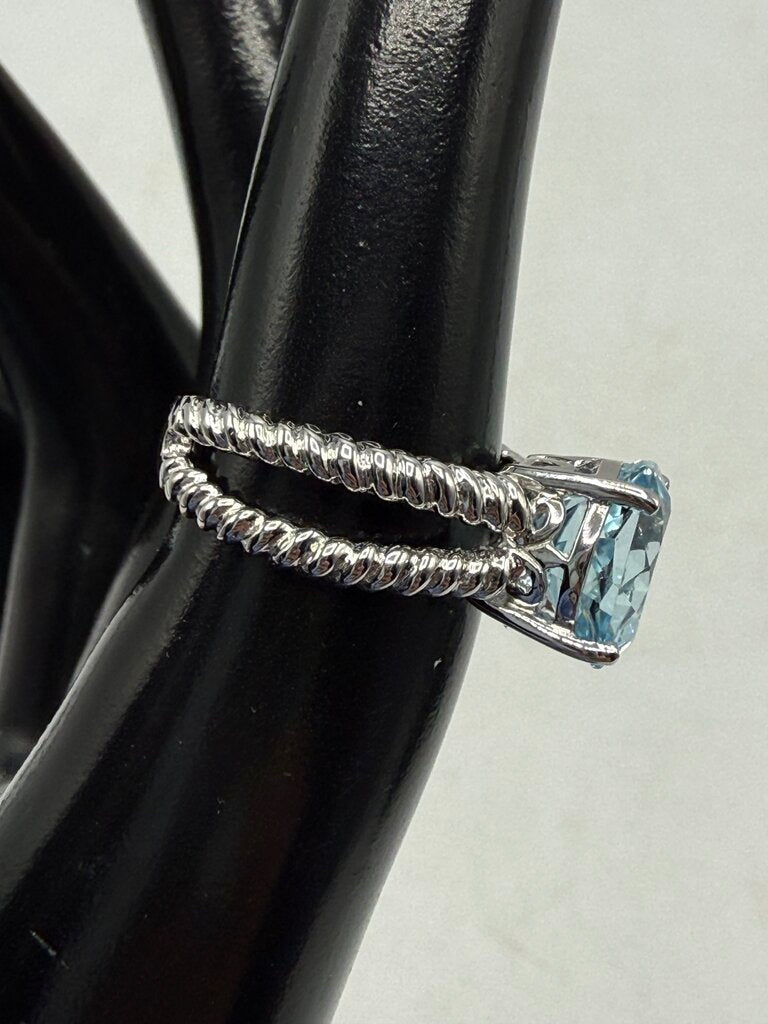 Blue Topaz Solitaire in Sterling Silver setting size 6 /ro