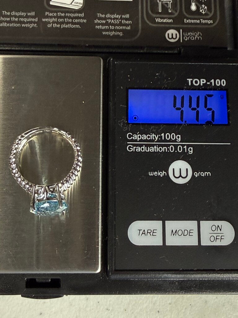 Blue Topaz Solitaire in Sterling Silver setting size 6 /ro