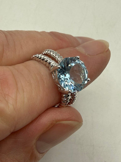 Blue Topaz Solitaire in Sterling Silver setting size 6 /ro