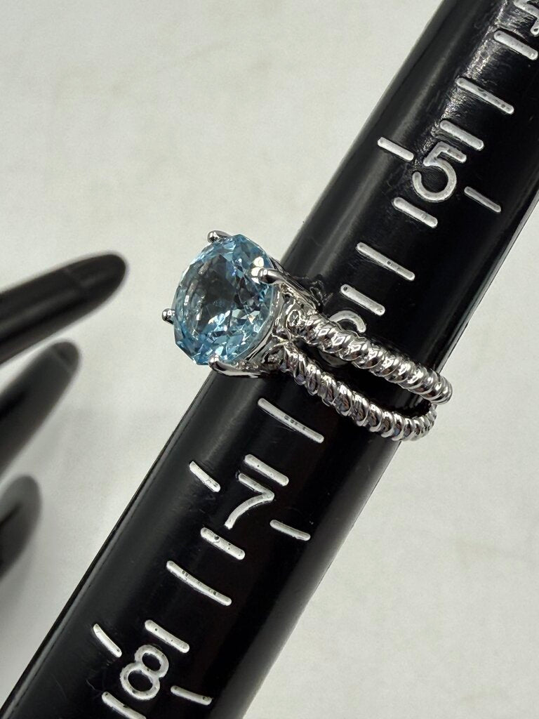 Blue Topaz Solitaire in Sterling Silver setting size 6 /ro