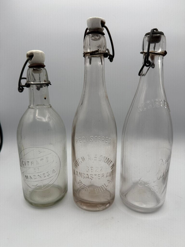 Set of 3 Antique Embossed Glass Bottles with Stoppers /ro