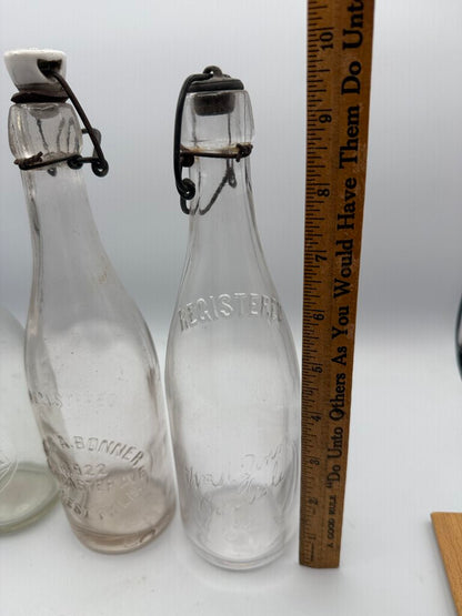 Set of 3 Antique Embossed Glass Bottles with Stoppers /ro