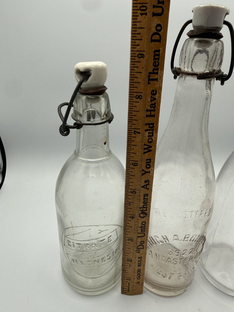 Set of 3 Antique Embossed Glass Bottles with Stoppers /ro
