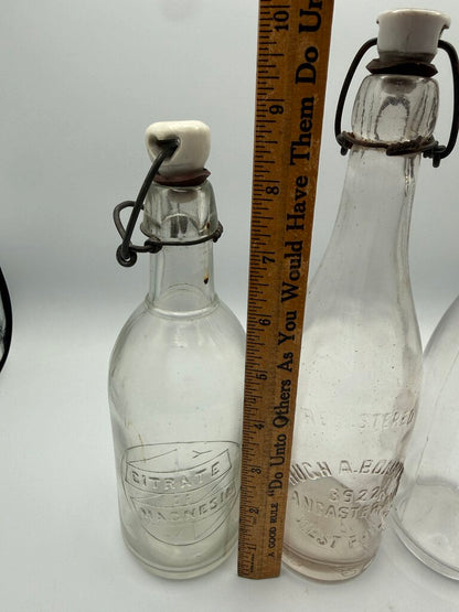 Set of 3 Antique Embossed Glass Bottles with Stoppers /ro