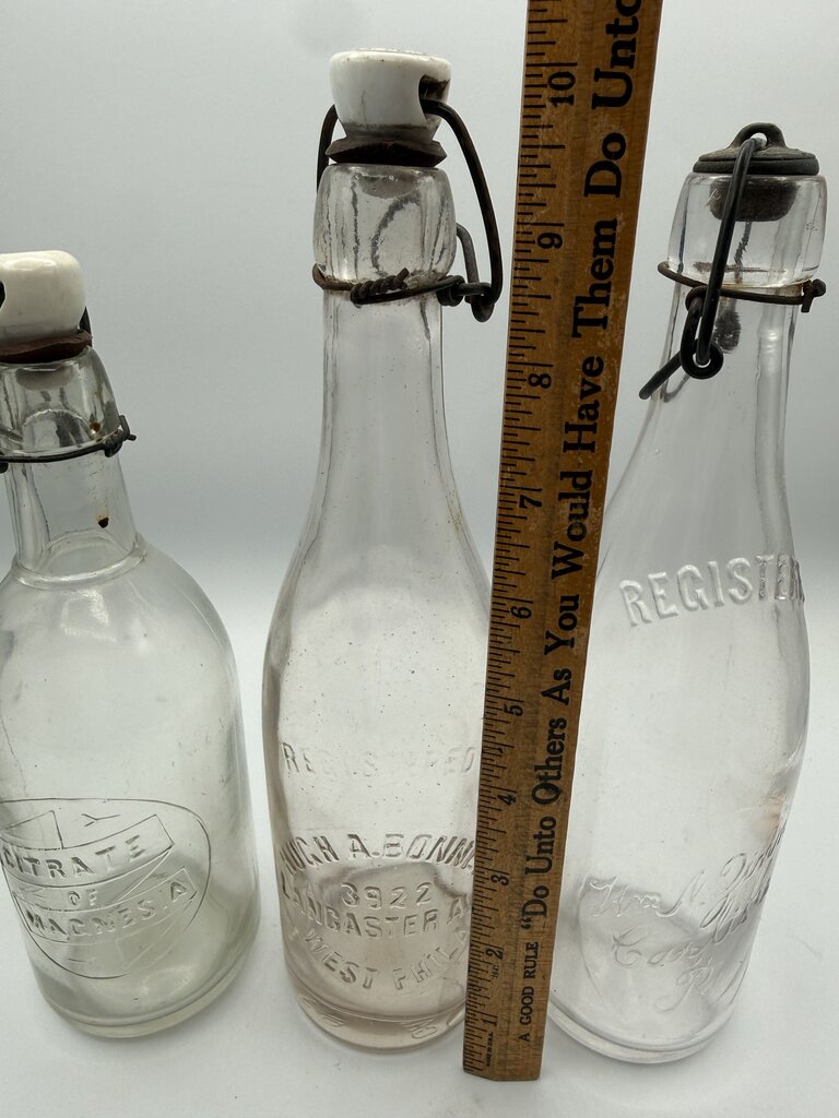 Set of 3 Antique Embossed Glass Bottles with Stoppers /ro